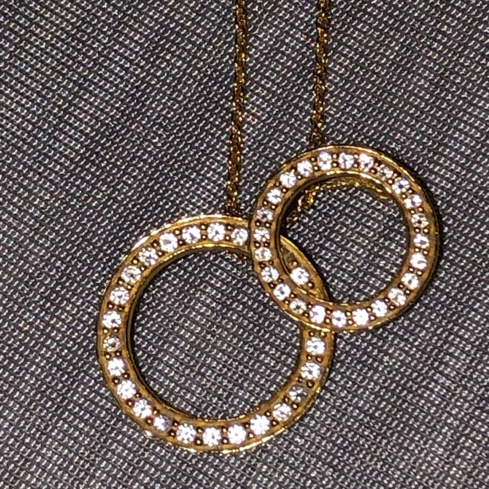 Roberto Coin double circle 18 karat gold diamond pendant necklace.